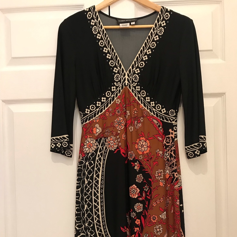 Mid length patterned dress, stretchy flared.